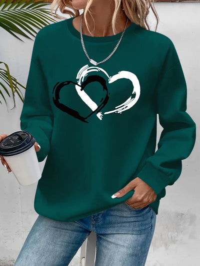 Sweatshirt mit Herz-Print – Verspielter Komfort mit Liebevollem Flair