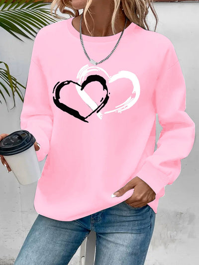Sweatshirt mit Herz-Print – Verspielter Komfort mit Liebevollem Flair