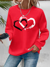 Sweatshirt mit Herz-Print – Verspielter Komfort mit Liebevollem Flair