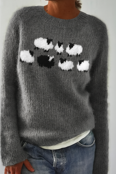 Gestrickter Pullover mit verspieltem Muster – Weckt Freude und Neugier auf den ersten Blick
