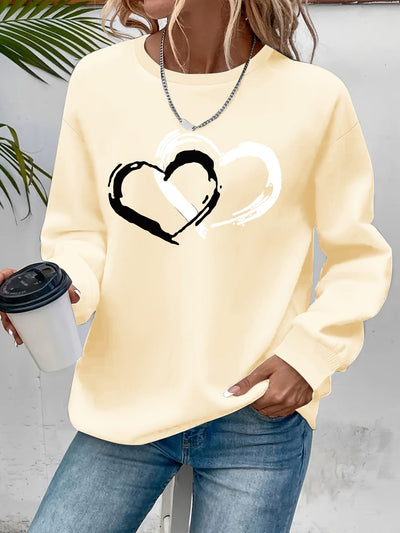 Sweatshirt mit Herz-Print – Verspielter Komfort mit Liebevollem Flair