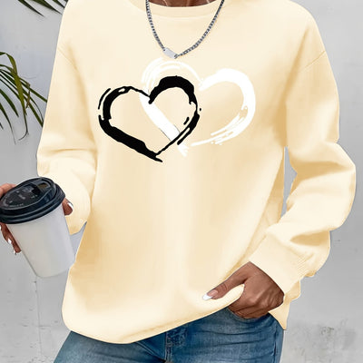Sweatshirt mit Herz-Print – Verspielter Komfort mit Liebevollem Flair
